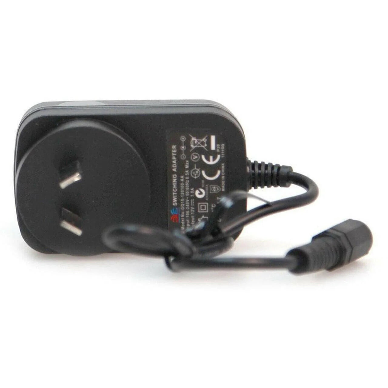 Black power adapter with plug on a white background