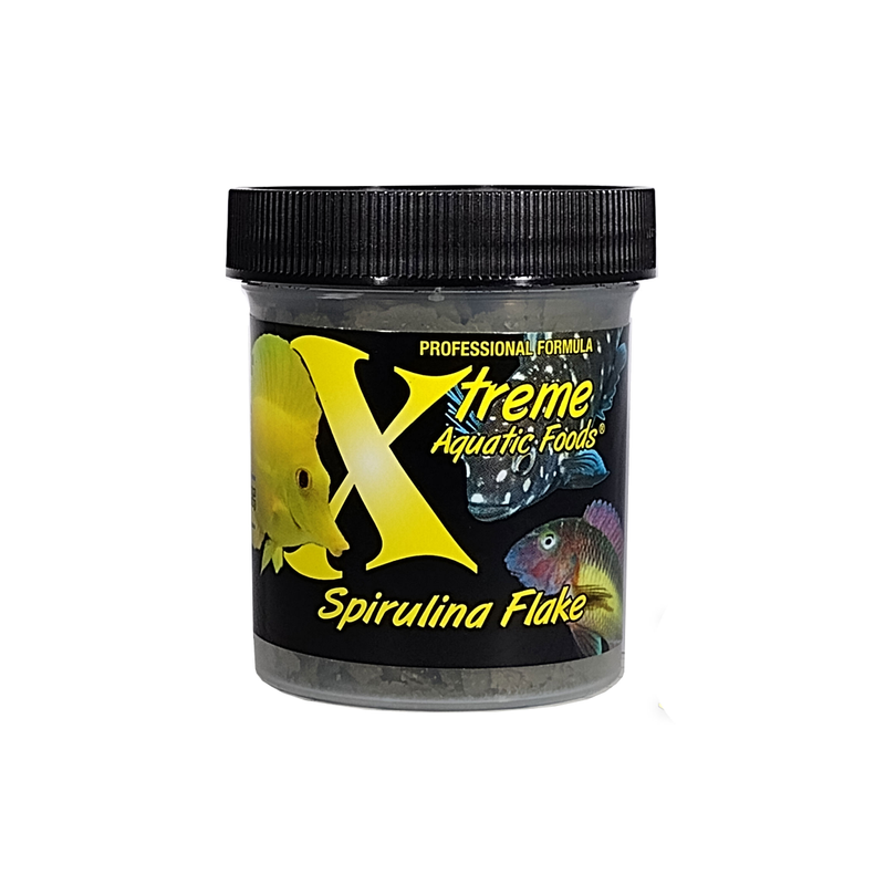 A 28g container of Xtreme brand Spirulina flake aquatic fish food with bright, colourful fish on the lavel.